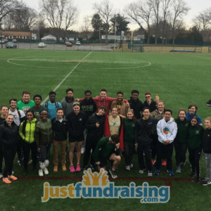 elms college track and field team on turf