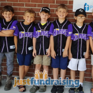 baseball team in front of brick wall