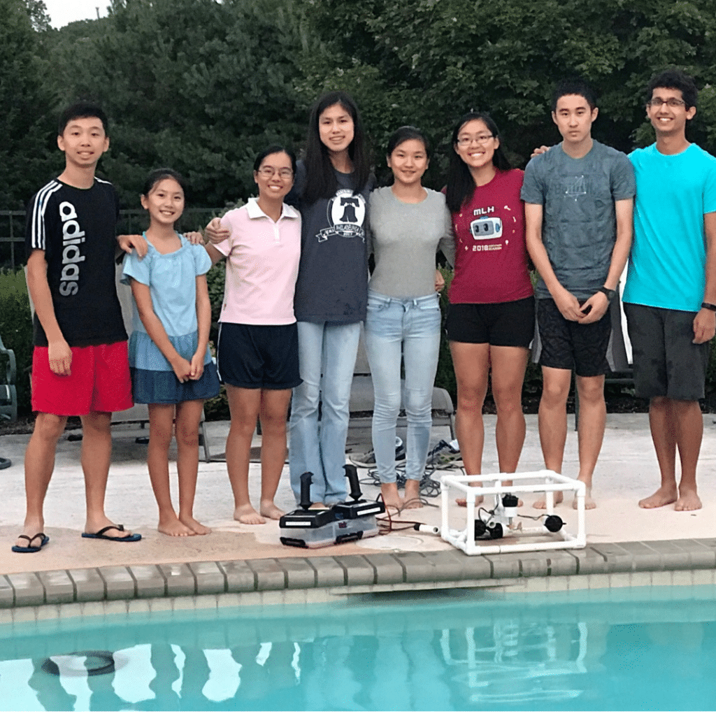 high school students next to pool